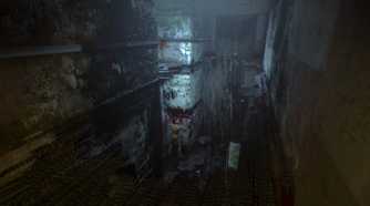 A screenshot from the game Outlast, showing a dark, dirty hallway.
