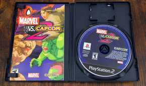The box and disc for Marvel vs. Capcom 2 game on PS2
