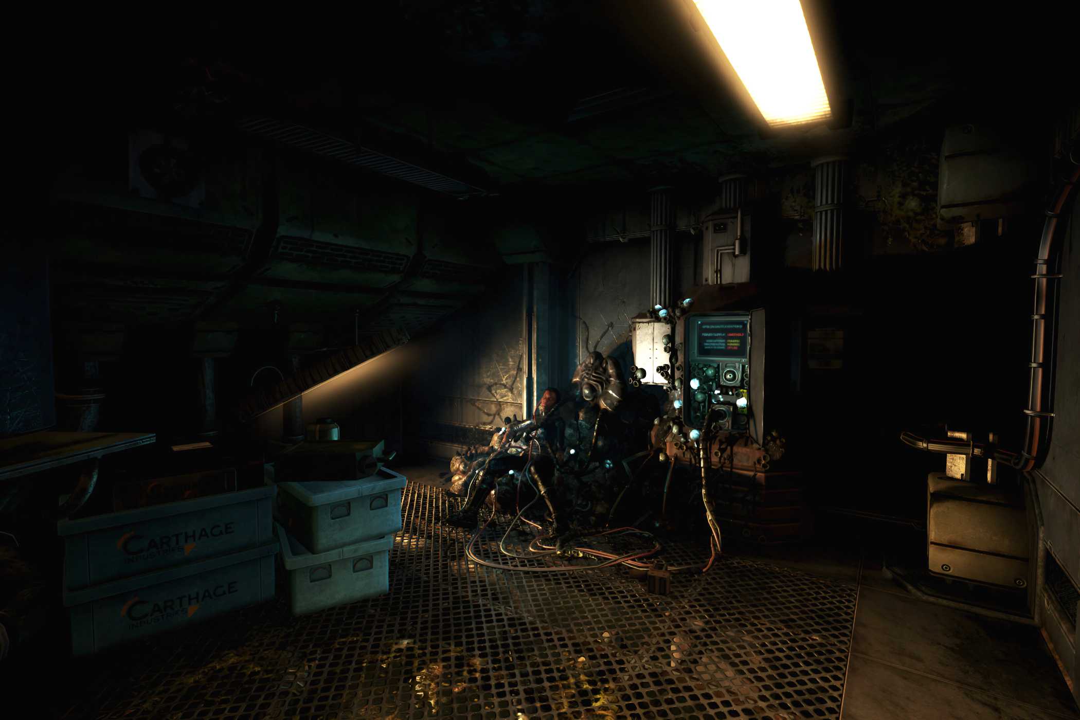 An image from the game "SOMA", showing a dimly-lit room with wires ripped out of the walls and a corpse.