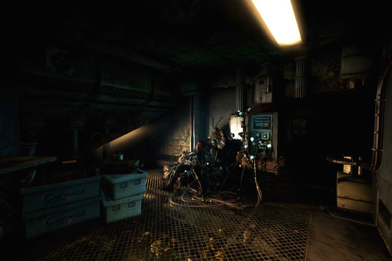 An image from the game "SOMA", showing a dimly-lit room with wires ripped out of the walls and a corpse.