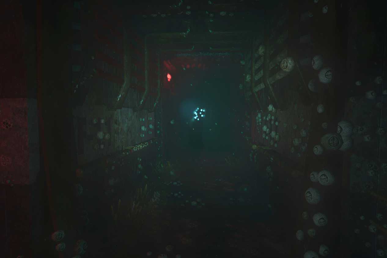 An image from the game "SOMA", showing Disco Head, a strange creature with a glowing blue head in the distance.