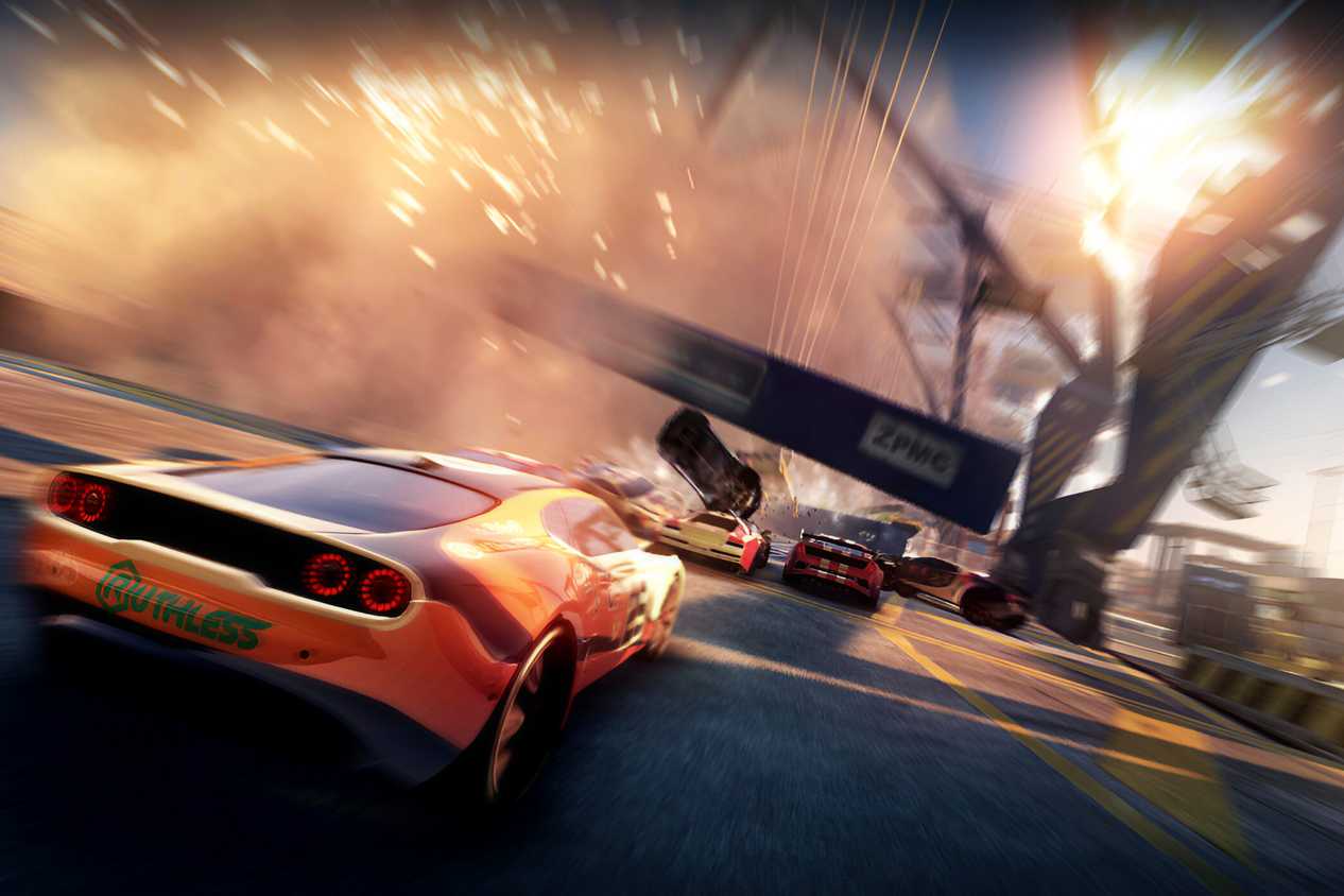 An image from the game "Split Second", showing a bright orange car racing while a bridge crashes around it.