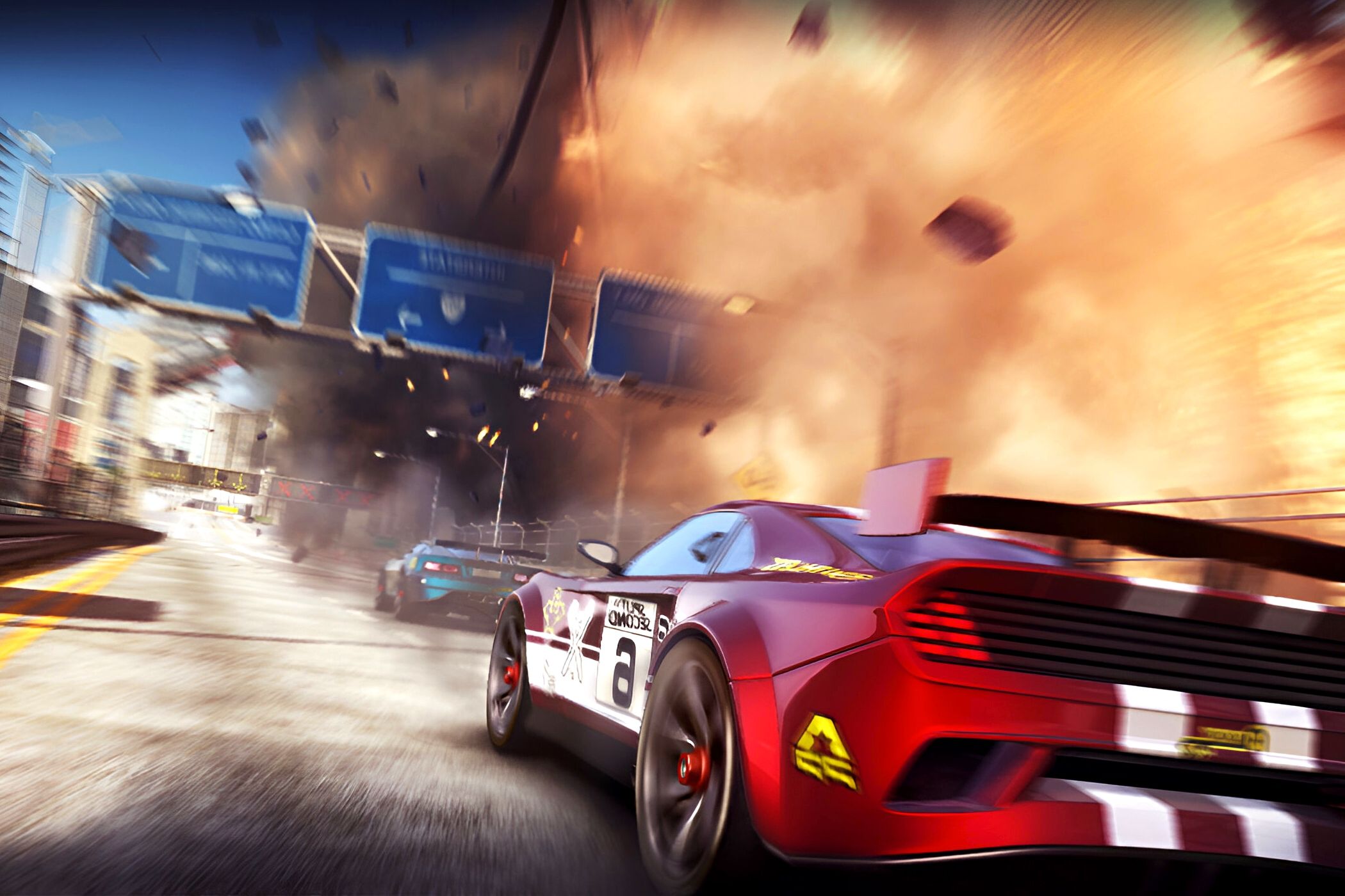 An image from the game "Split Second", showing the rear of a red car with white stripes and a wing while the road around it blows up.
