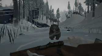 A screenshot from the game "The Long Dark", showing a bear charging towards the screen as cold winds blow around it.