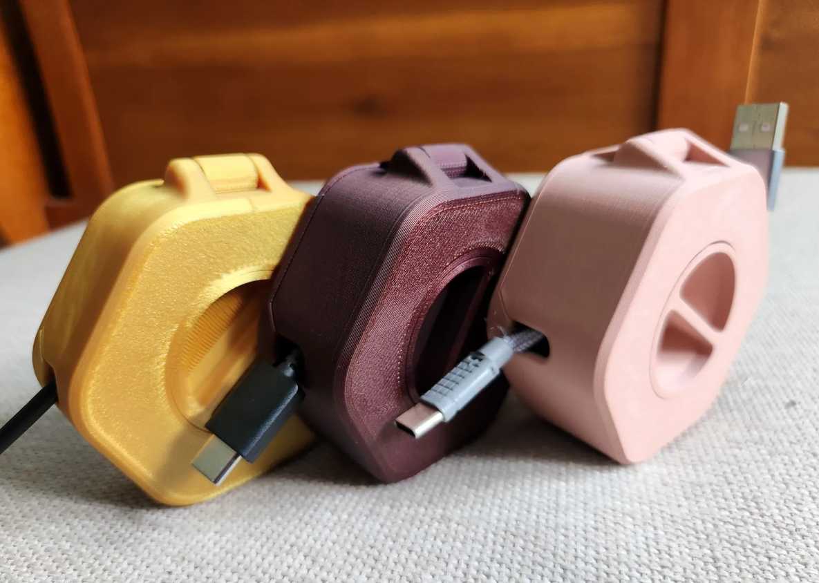 Three different cable organizers side by side