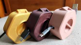 Three different cable organizers side by side