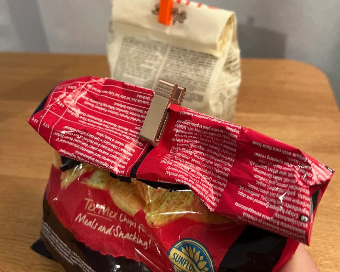 Two bags with clips at the end of each