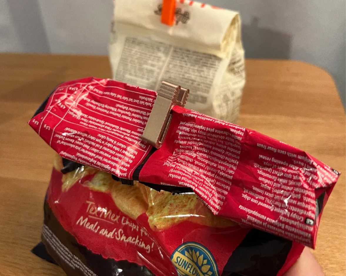 Two bags with clips at the end of each