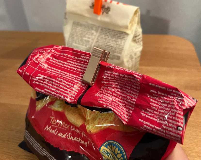 Two bags with clips at the end of each