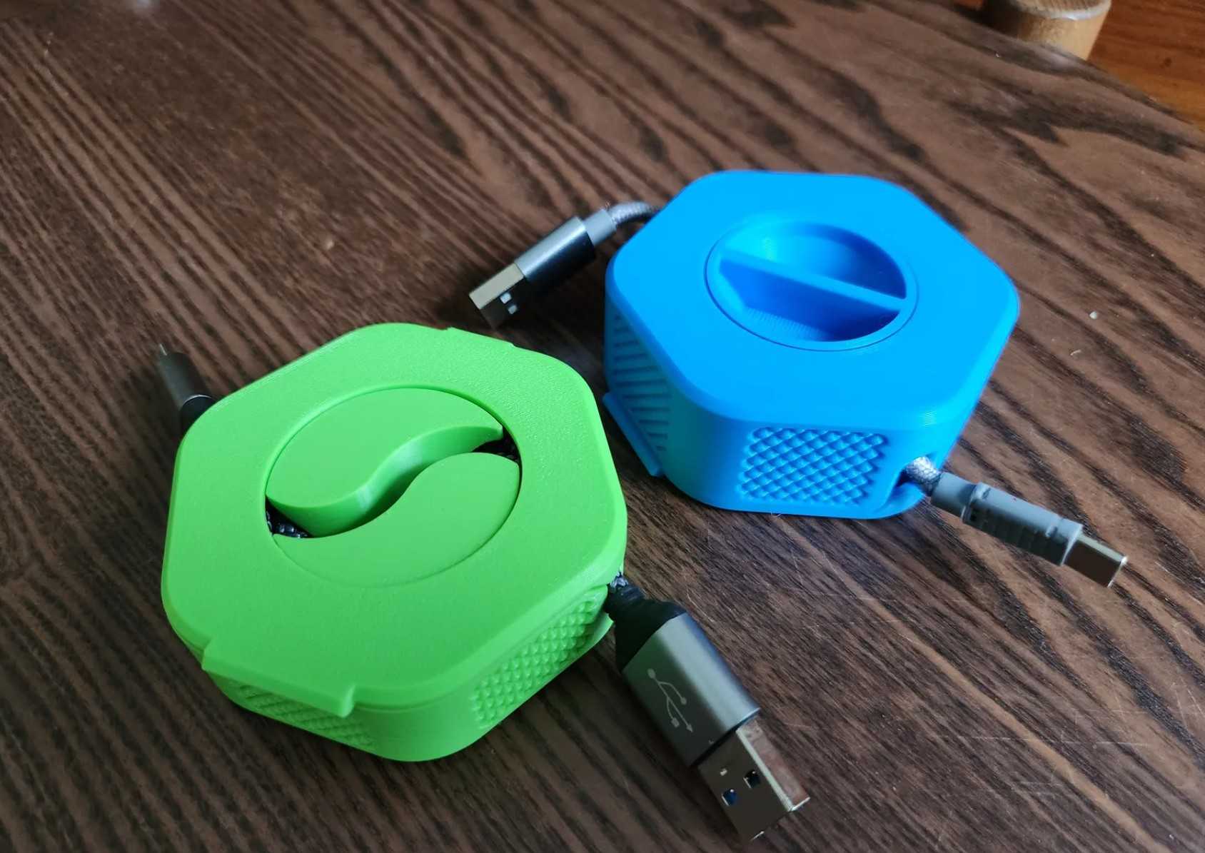 Two cable organizers with USB cables on each