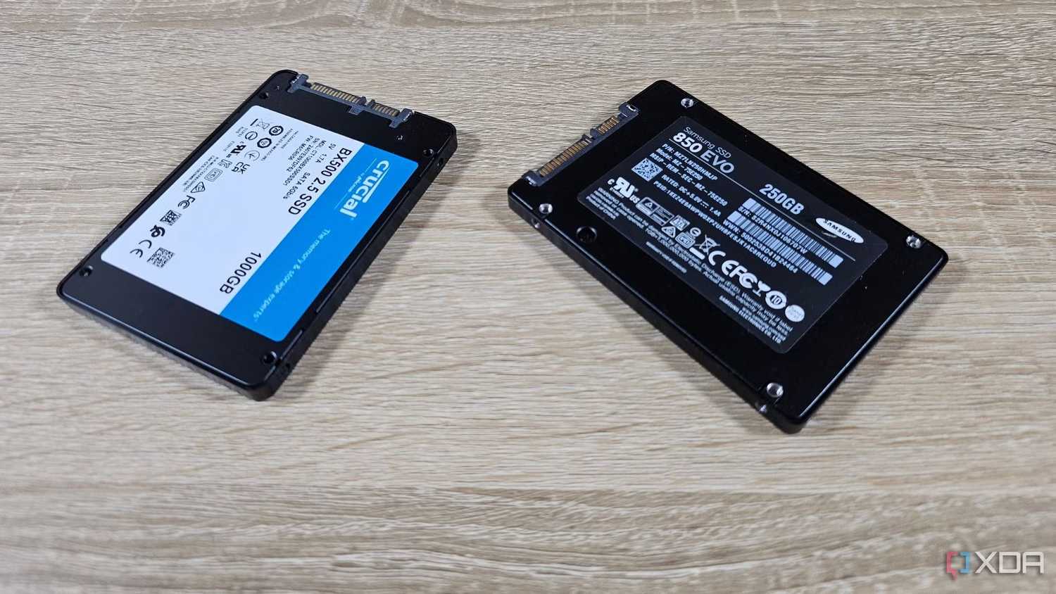 two Crucial and Samsung internal SSDs on a table