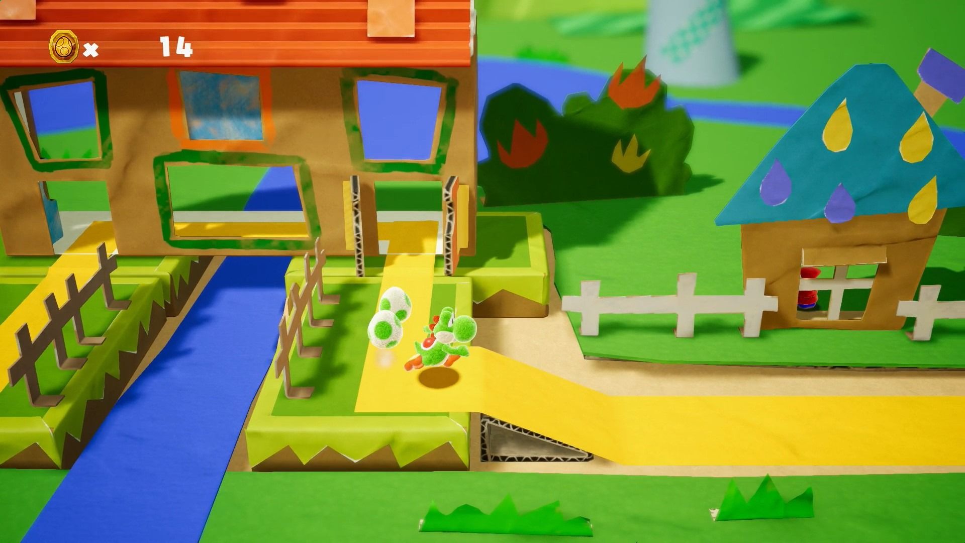 Single player green Yoshi walking through level in Yoshi's Crafted World