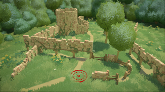 A ruined castle with overgrown vegetation
