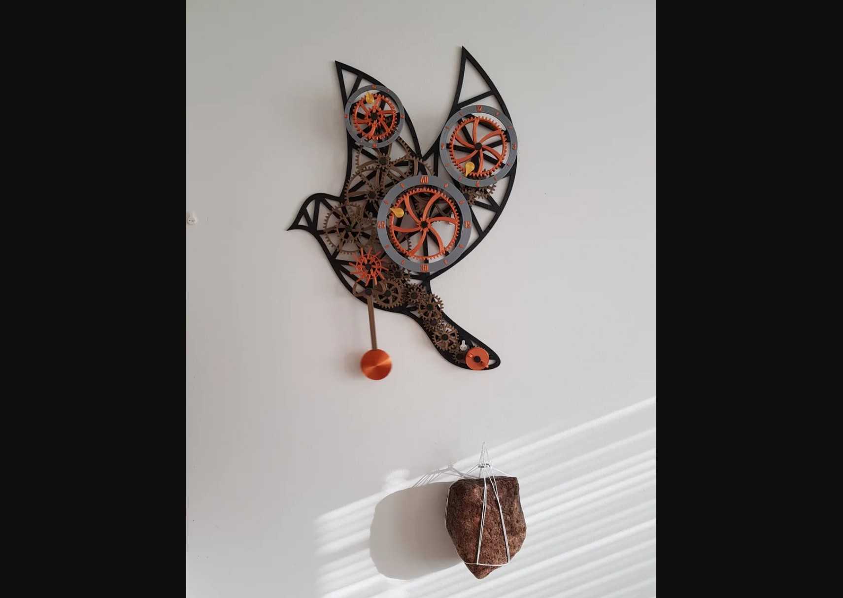 Mechanical clock with weight attached to it