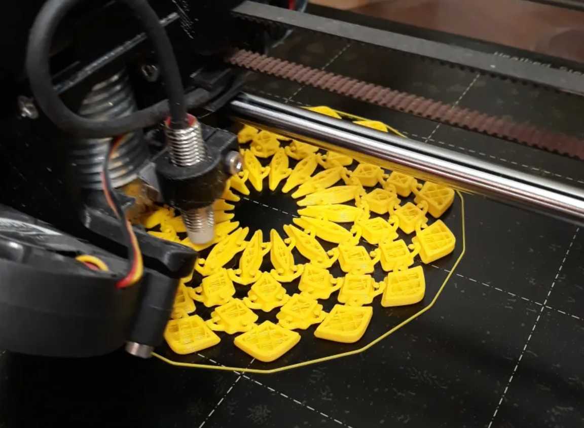 A 3D printer printing sunflower fabric coaster