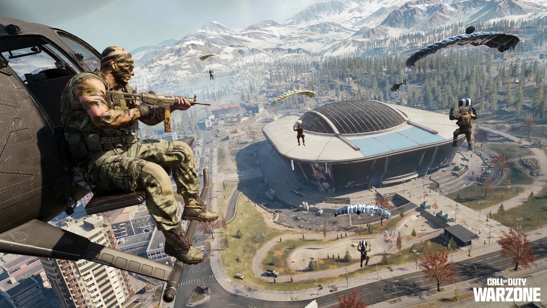 Call of Duty Operator riding on the side of a helicopter, watching other Operators drop into Warzone