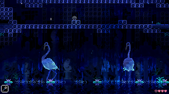 Two herons in the rain underneath the player ball.