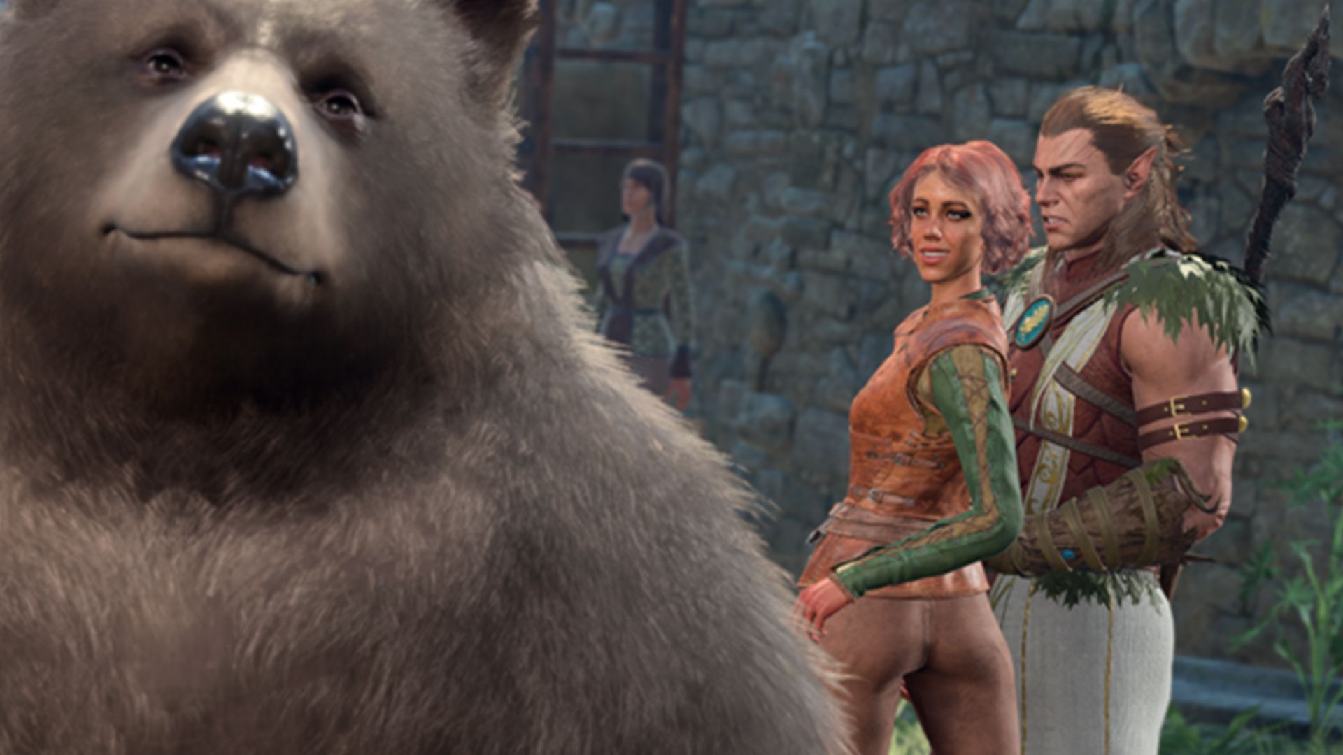 A bear with two humans in the background
