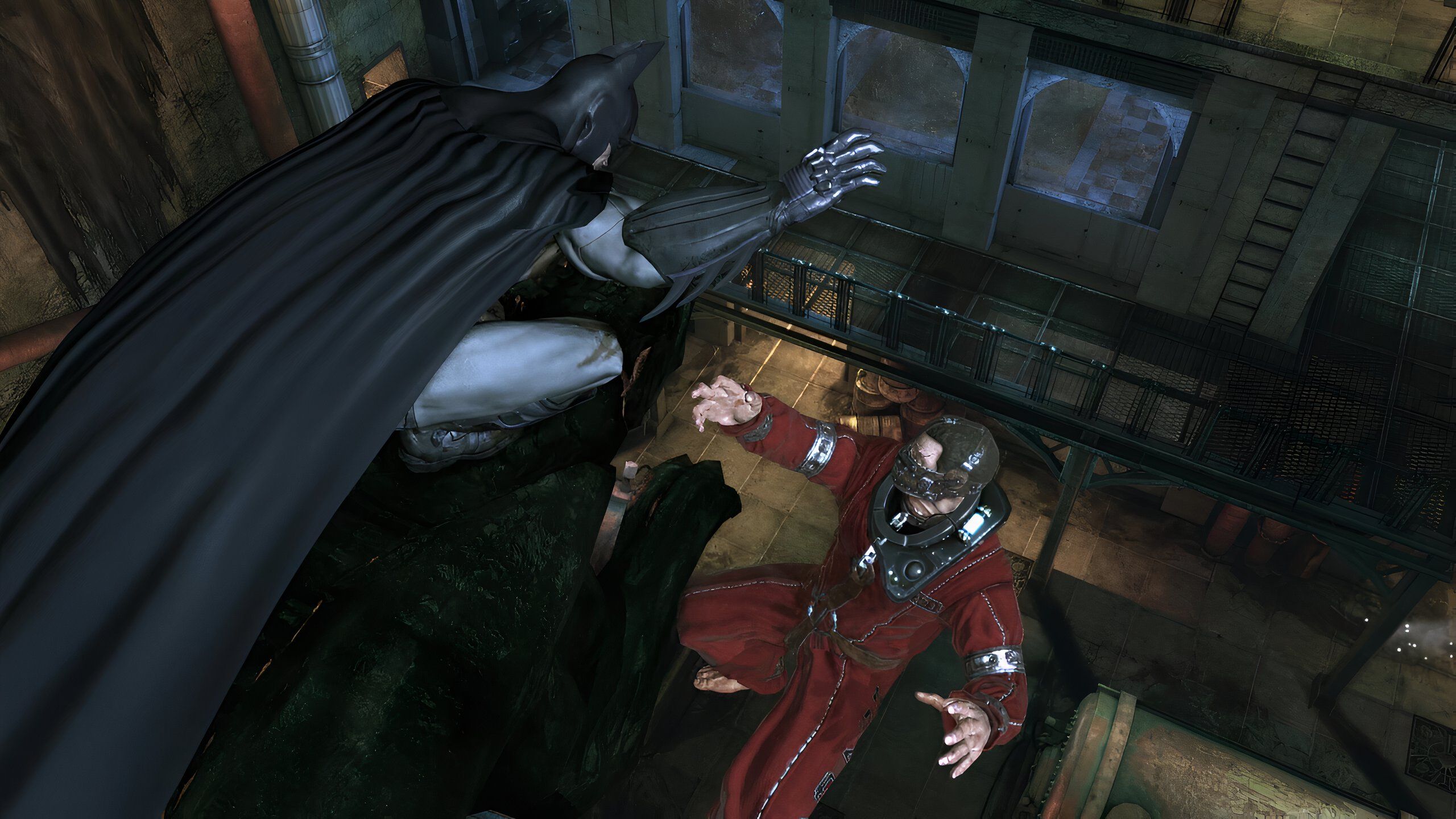 An image from the game Batman: Arkham Asylum, showing Batman taking down Firefly while seated atop a stone statue.
