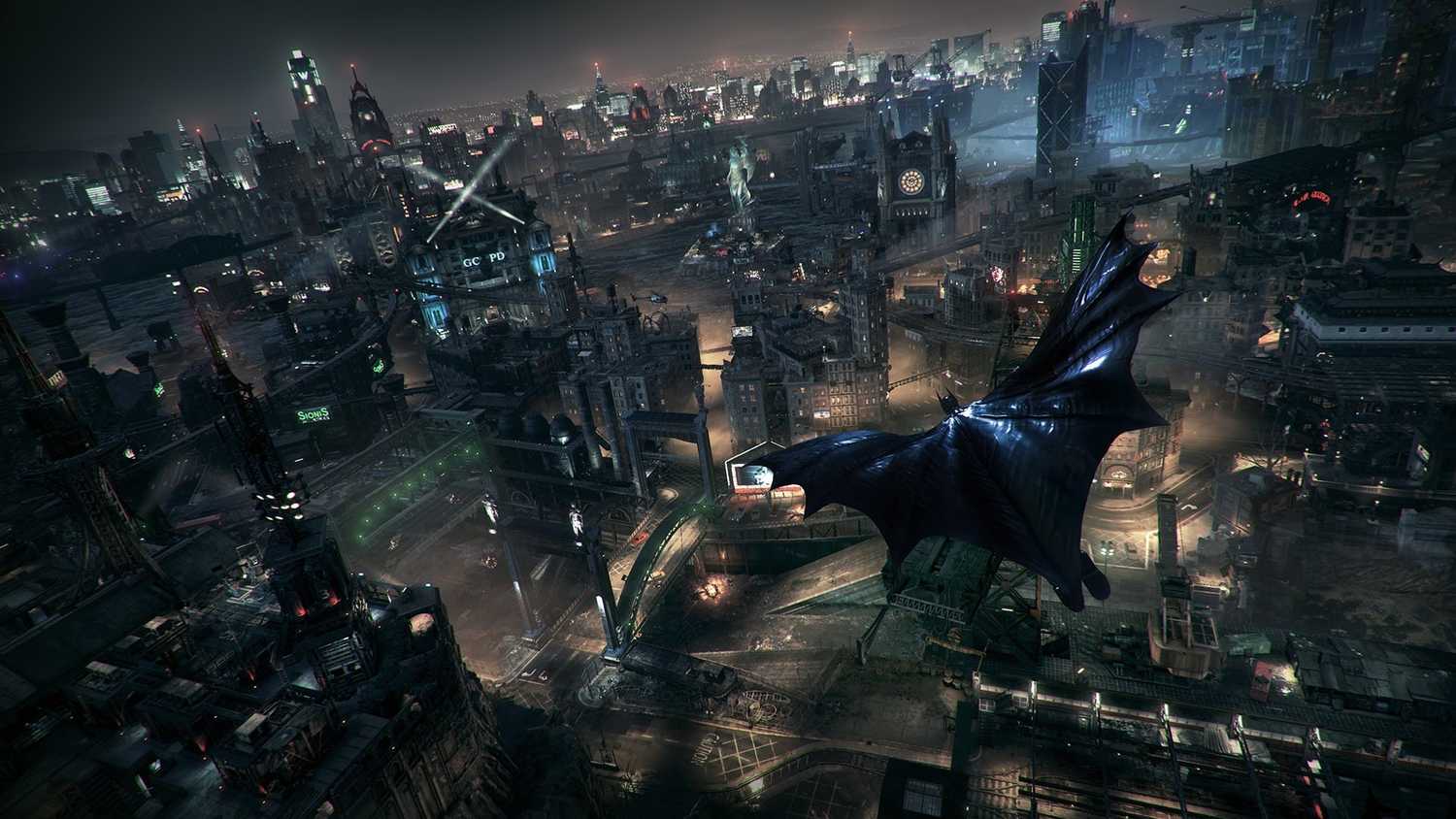 batman flying above city at night