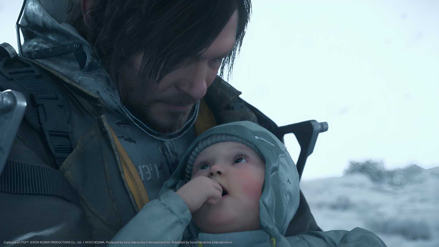 An image from the game Death Stranding 2: On The Beach, showing Sam and a baby.