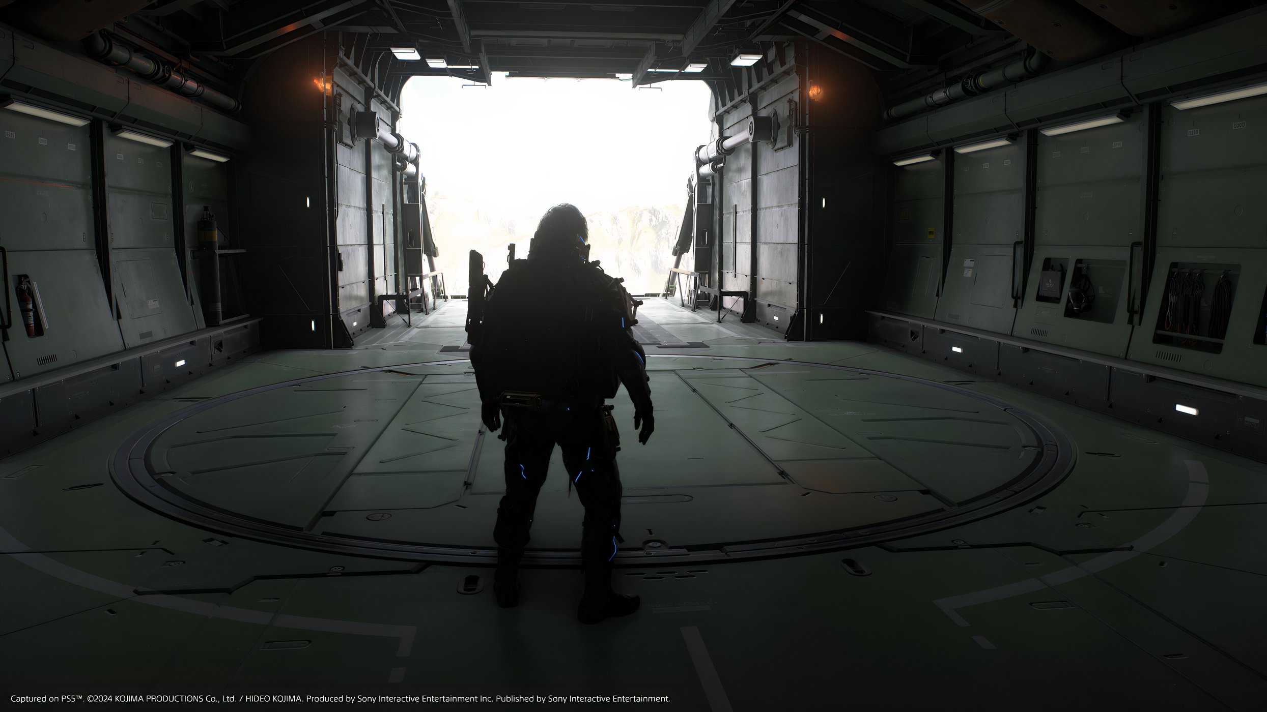 An image from the game Death Stranding 2: On The Beach, showing Sam's silhouette against an airplane hangar.