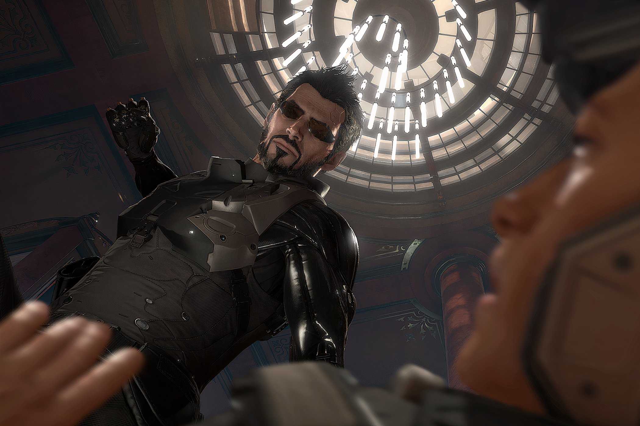 A screenshot from the game Deus Ex: Mankind Divided, showing a man about to punch someone.