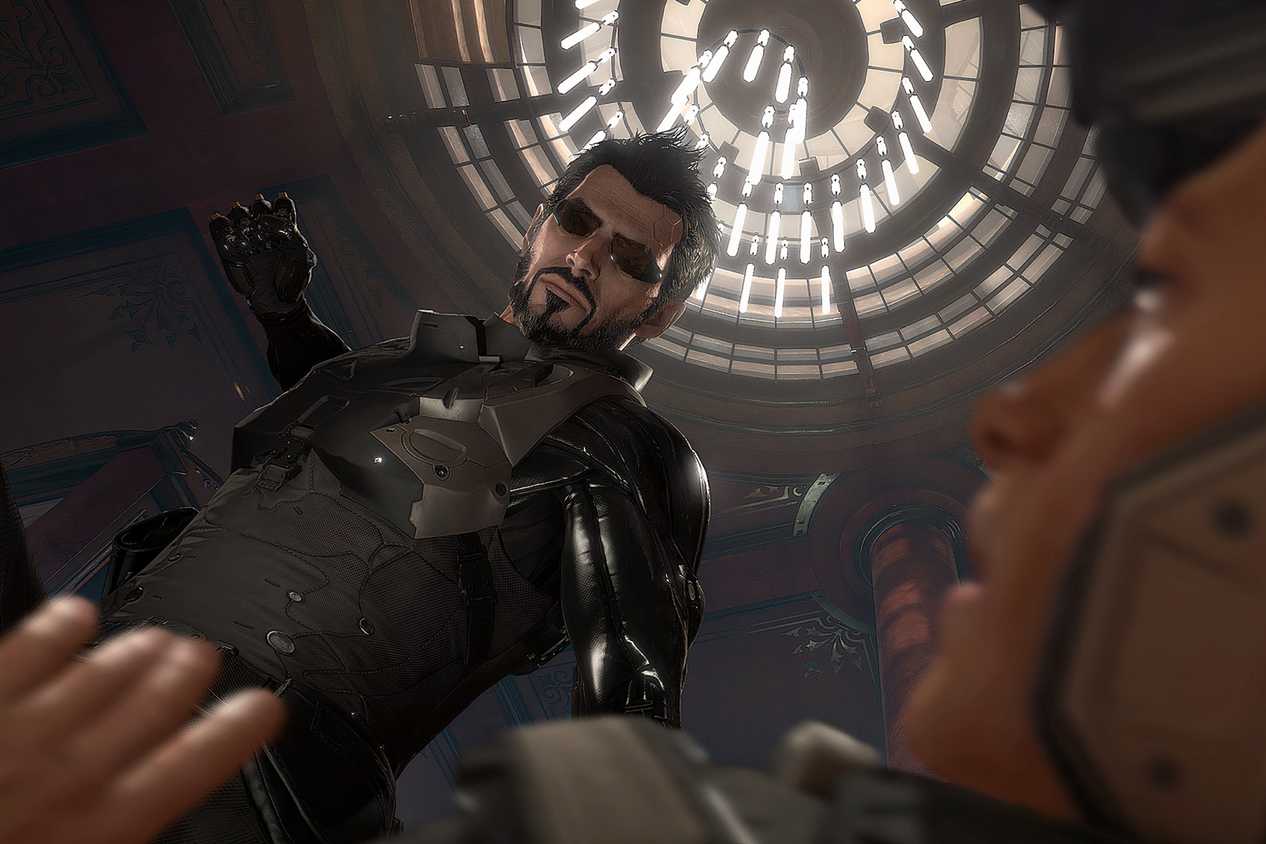 A screenshot from the game Deus Ex: Mankind Divided, showing a man about to punch someone.