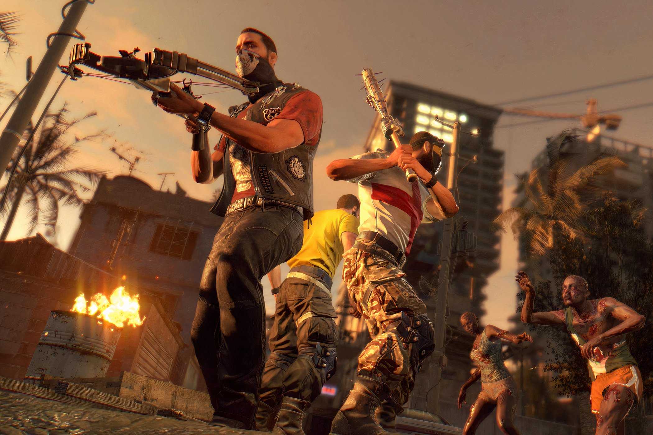 A screenshot from Dying Light, showing three people fending off zombies.