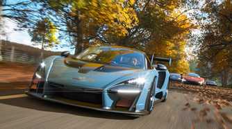 A screenshot from the game "Forza Horizon 4", showing a blue McLaren Senna racing against its competitors during fall season.