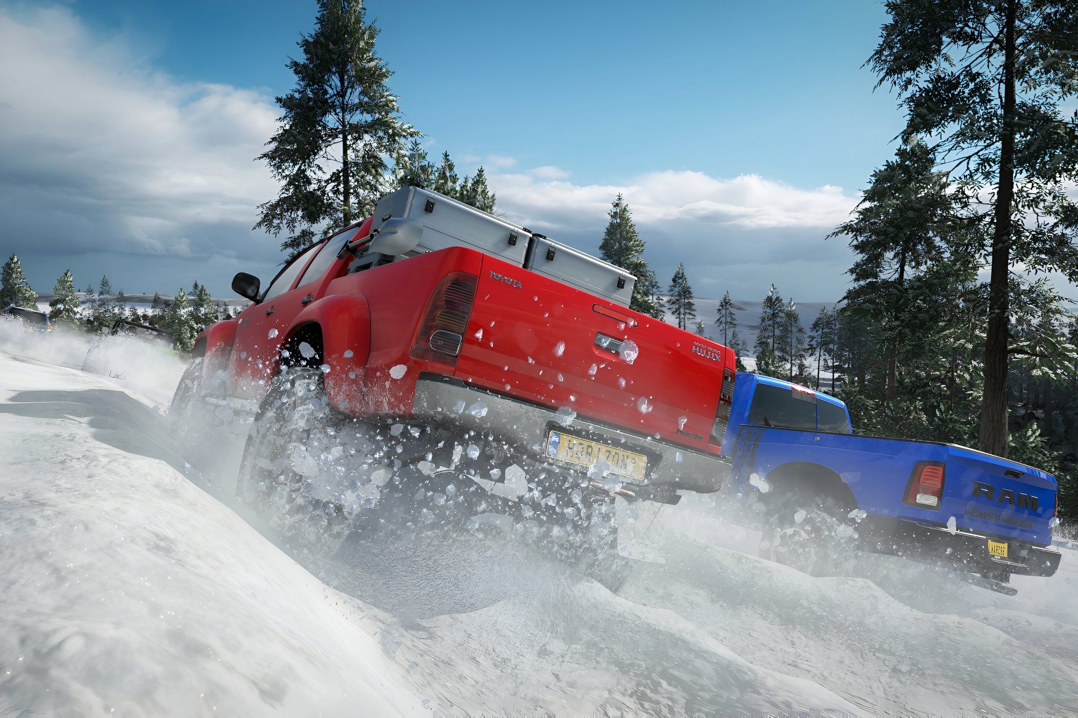 A screenshot from the game "Forza Horizon 4", showing a red Toyota Hilux racing against a blue Dodge Ram truck in snow.