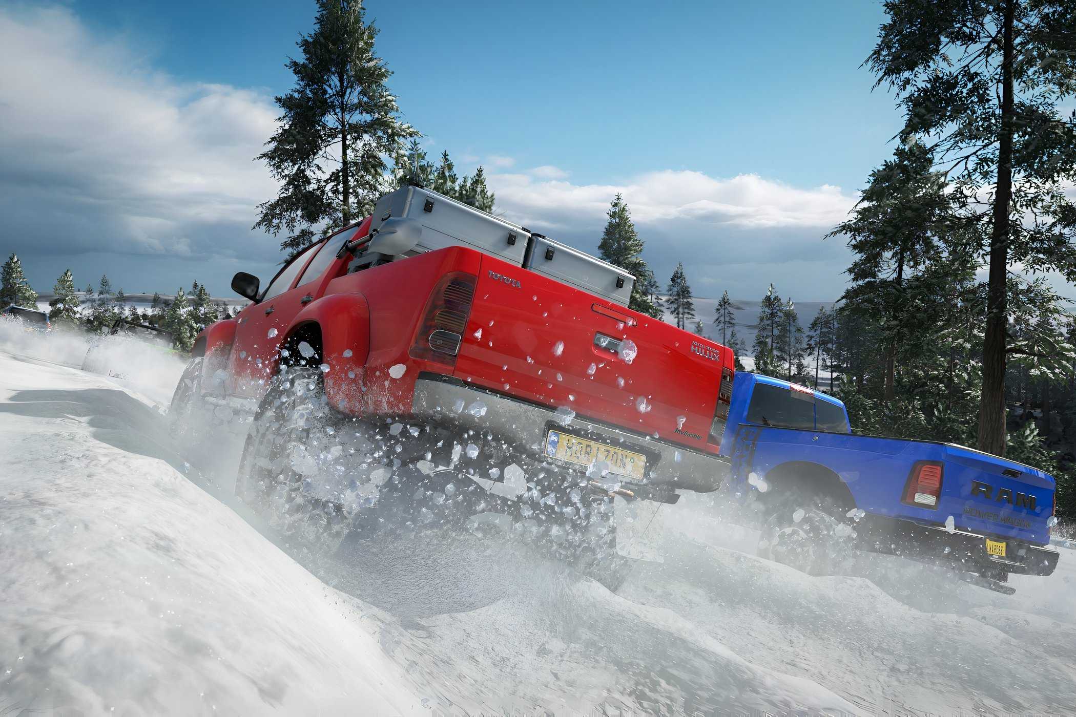 A screenshot from the game "Forza Horizon 4", showing a red Toyota Hilux racing against a blue Dodge Ram truck in snow.