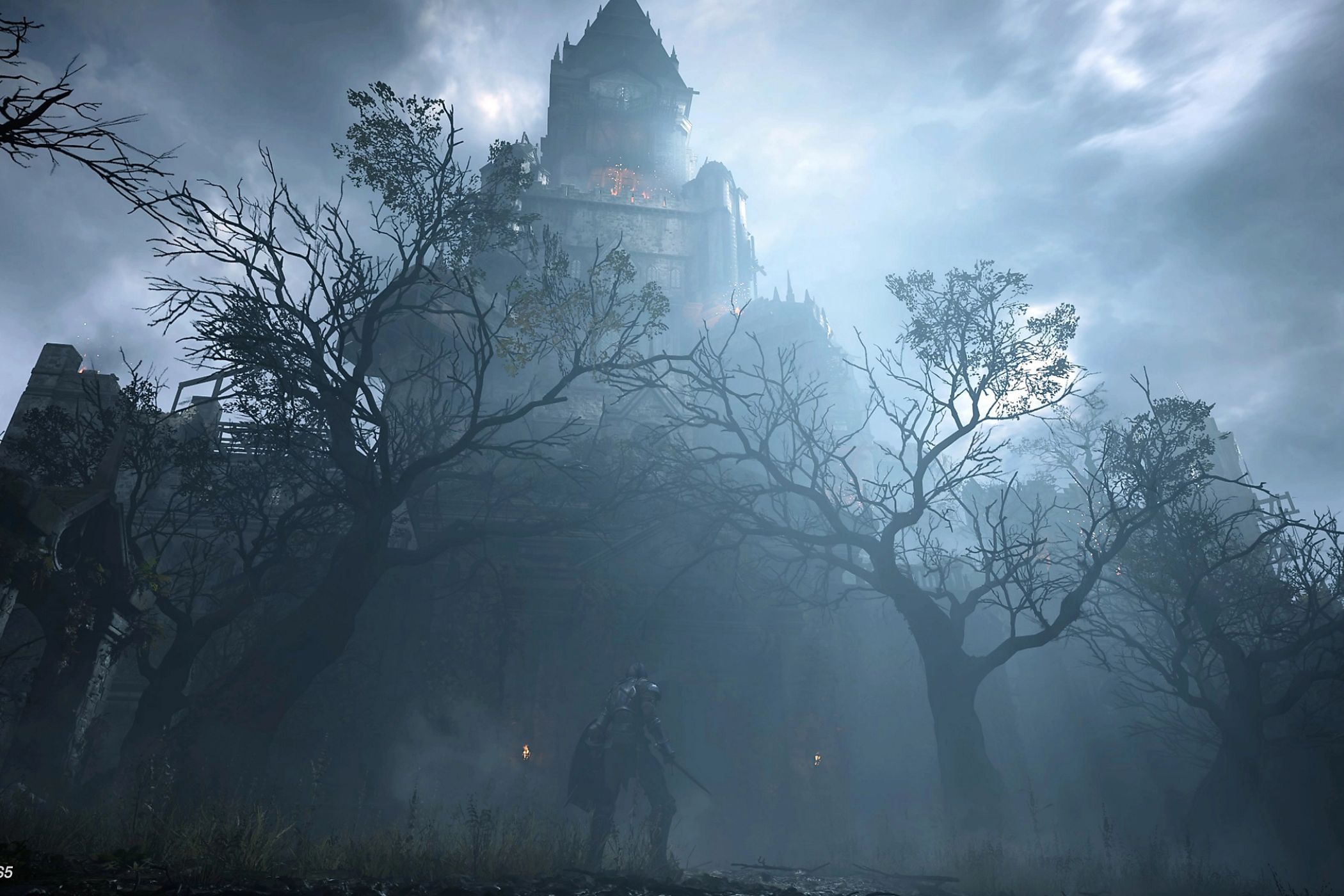 Demons Souls knight standing in front of castle