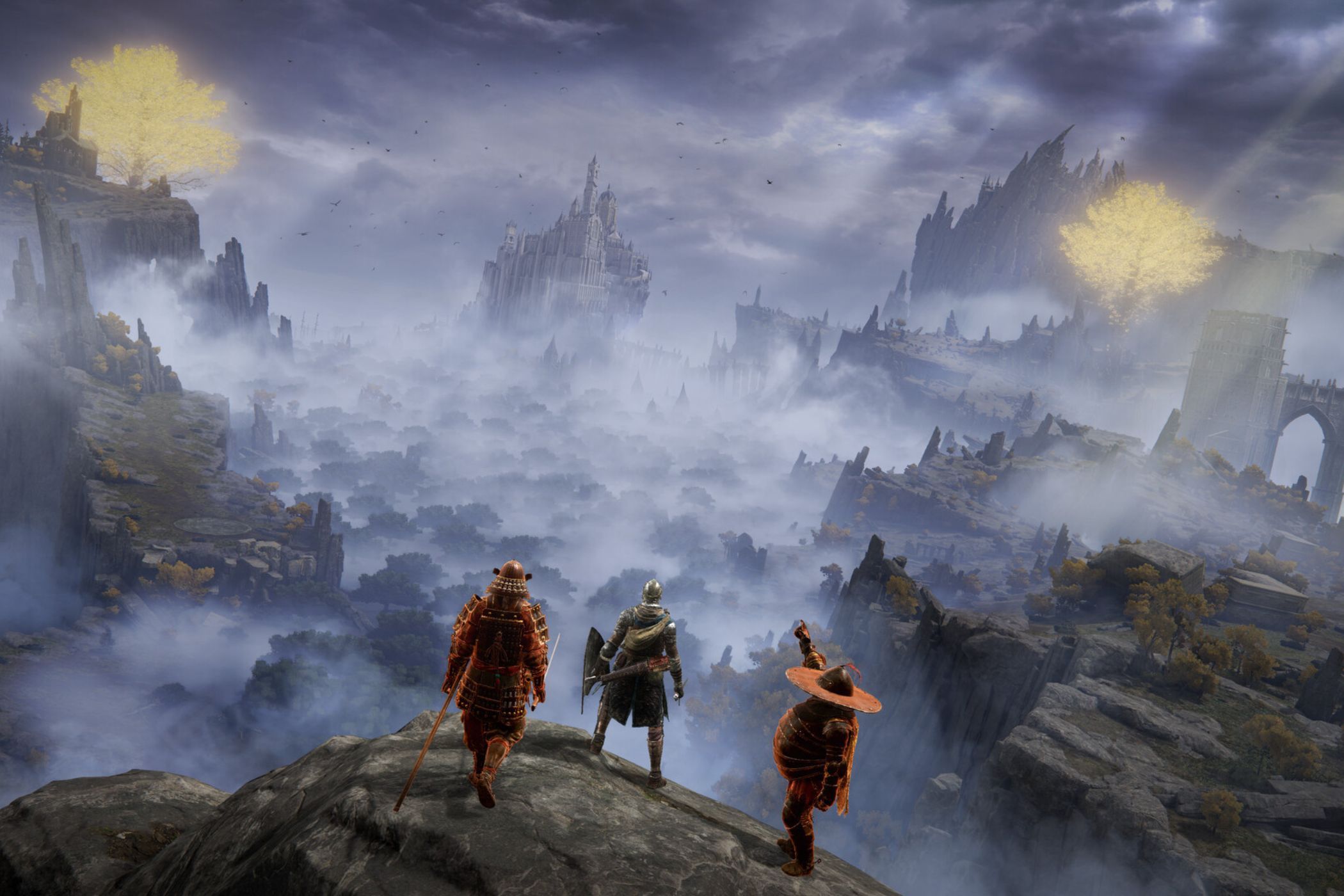 Elden Ring player standing next to summons on cliffside