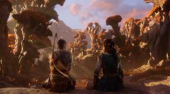 An image from the game God of War Ragnarok, showing Atreus and Angrboda sitting in Ironwood, a mythical forest.