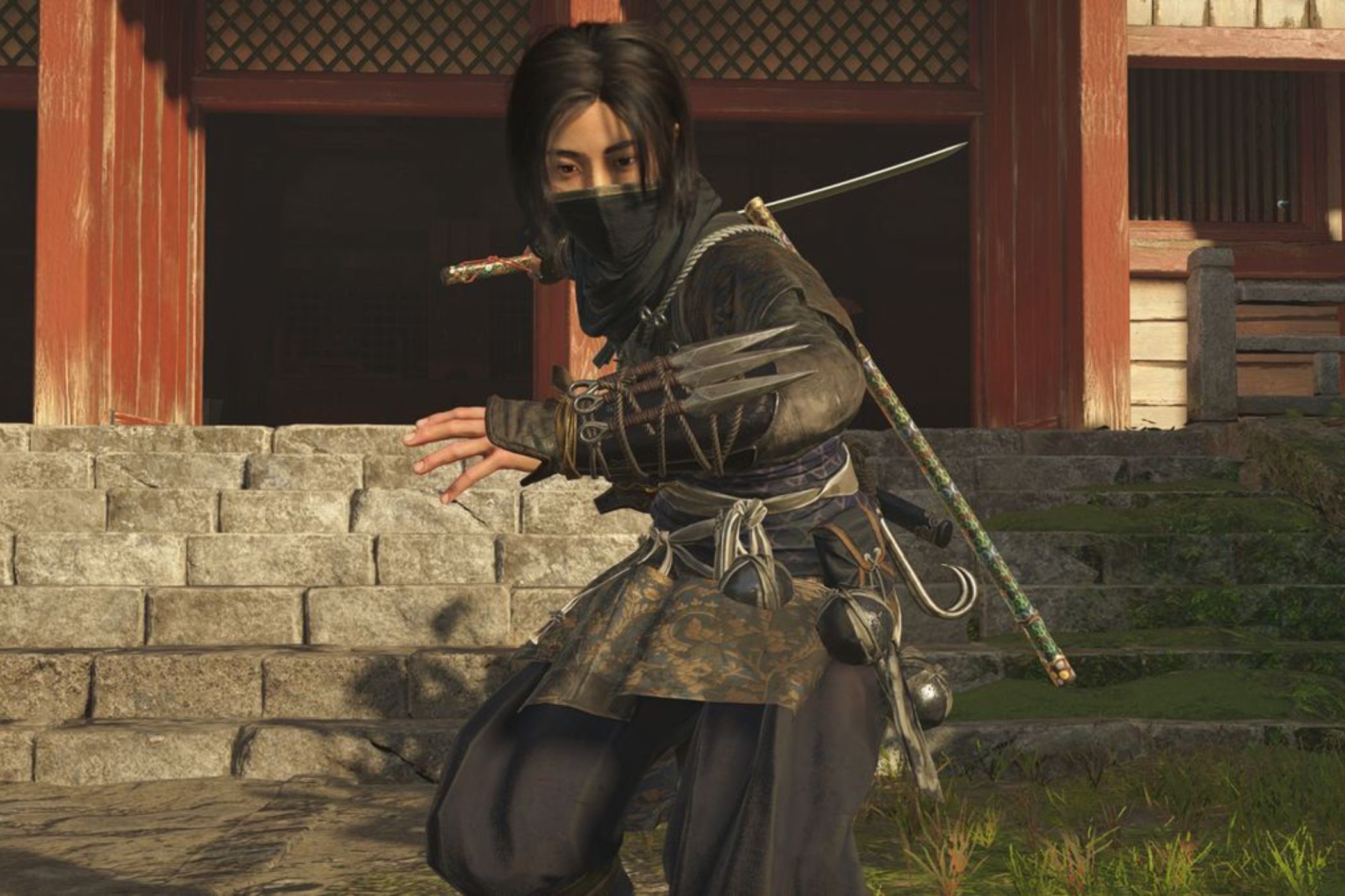 Assassin's Creed Shadows Naoe crouched in courtyard