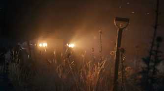 An image from the game Mafia: The Old Country, showing a dark atmosphere lit only by a car's headlights.