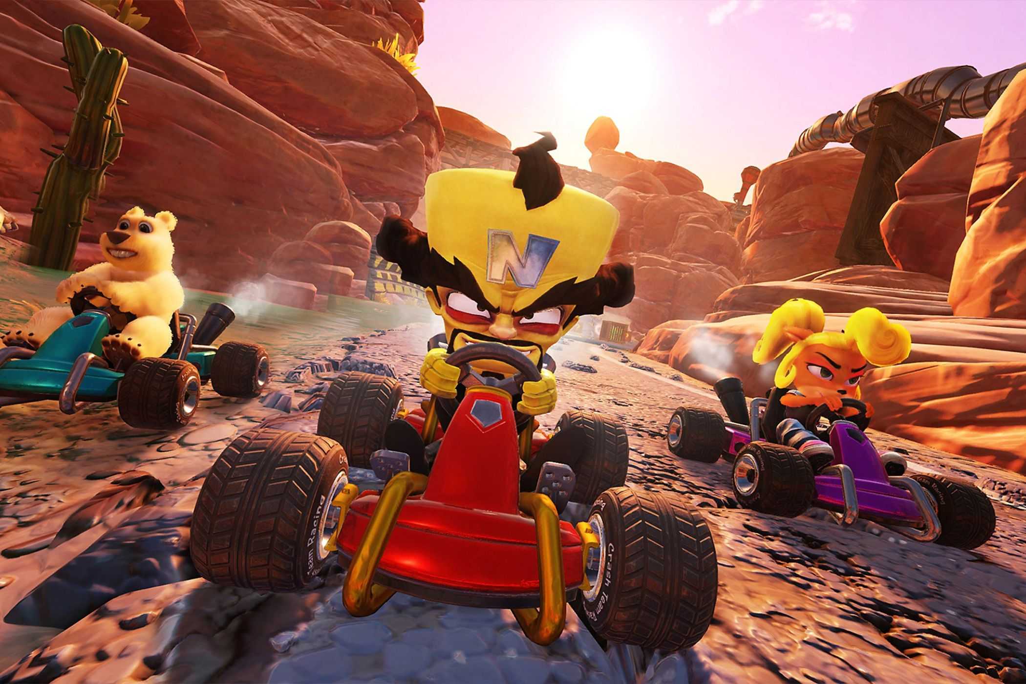 Crash Team Racing racers driving in crevice