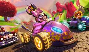 Crash Team Racing racers driving under rainbow