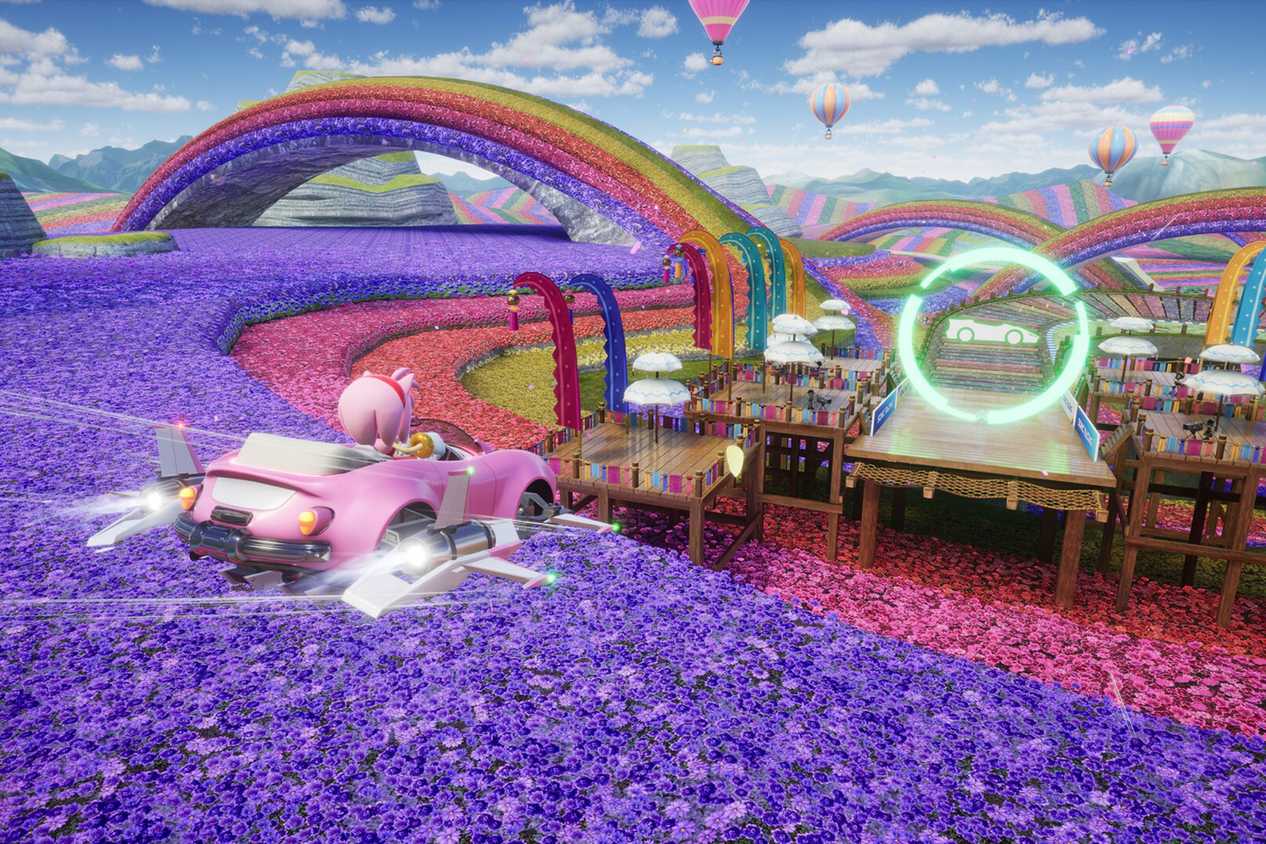 Sonic Racing Crossworlds amy driving in flower field