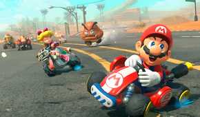 An image from Mario Kart World, showing Mario skidding in a kart as Princess Peach chases him.