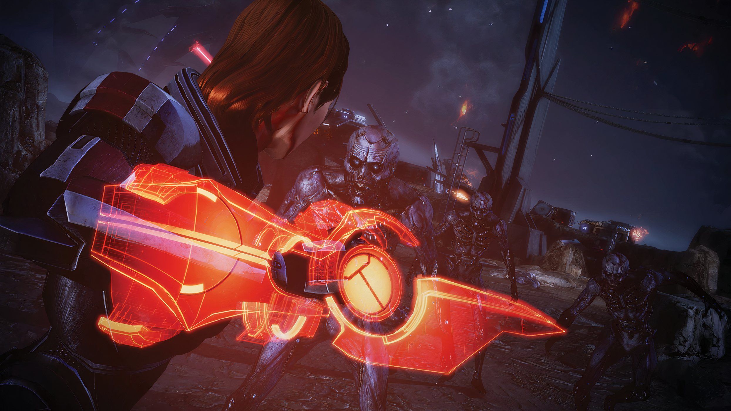An image from Mass Effect Legendary Edition, showing Commander Shepard using their tech armor in combat.