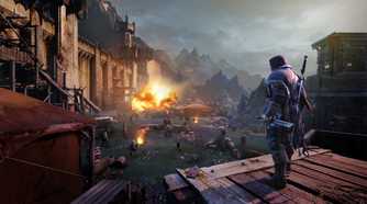 An image from Middle-Earth: Shadow of Mordor, showing the protagonist looking at a battle-ruined arena.