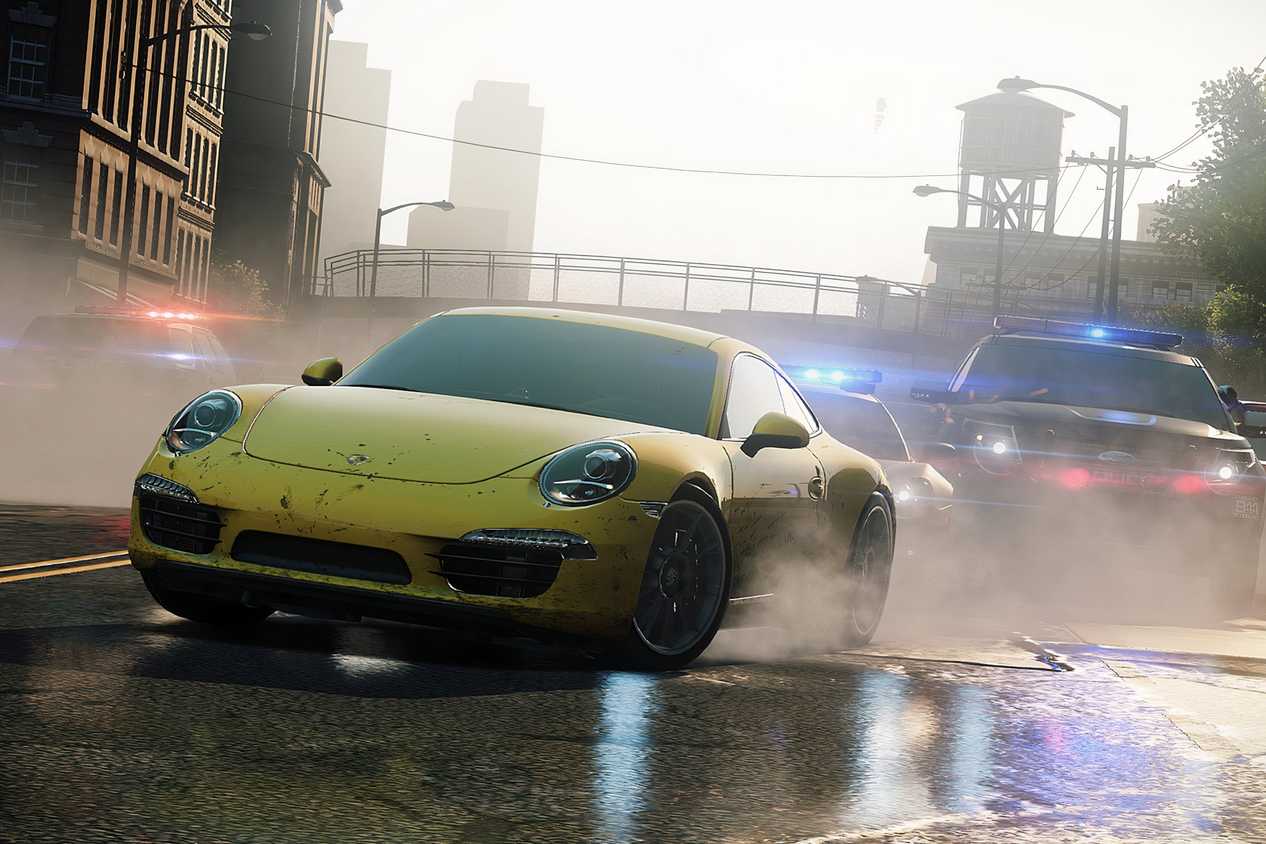 A screenshot from Need for Speed: Most Wanted 2012, showing a yellow Porsche being chased by cops.