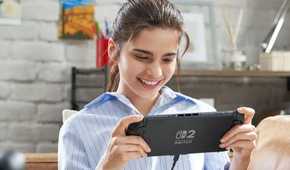 Nintendo Switch 2 player holding system in handheld mode
