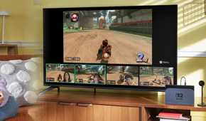 Nintendo Switch 2 system and camera playing Mario Kart World