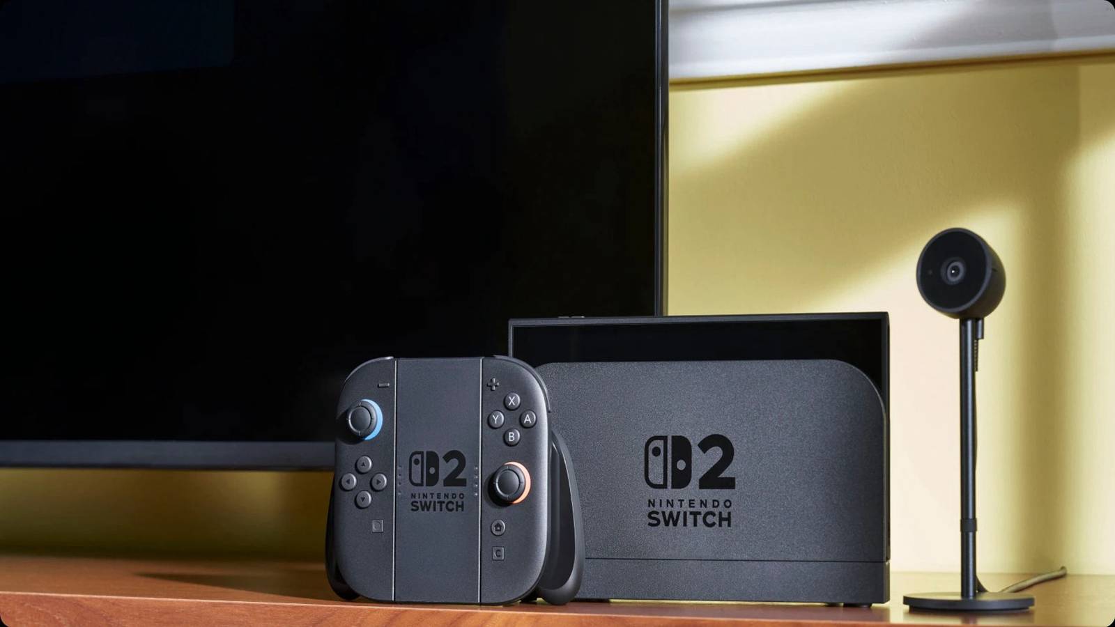 An official photo of the Nintendo Switch, the controller, and the mic