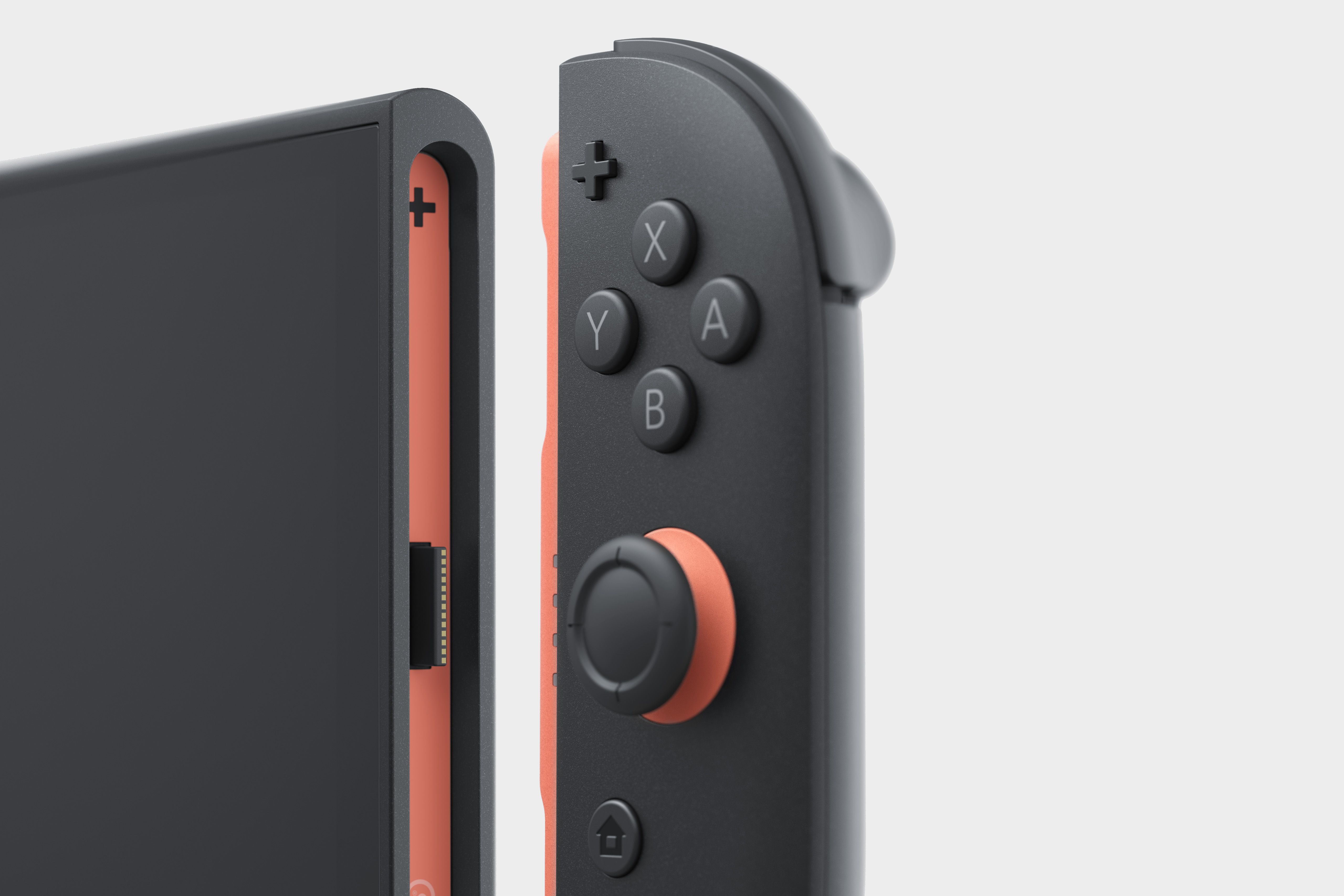 Close-up of a Joy-Con 2 approaching the Nintendo Switch 2 console unit