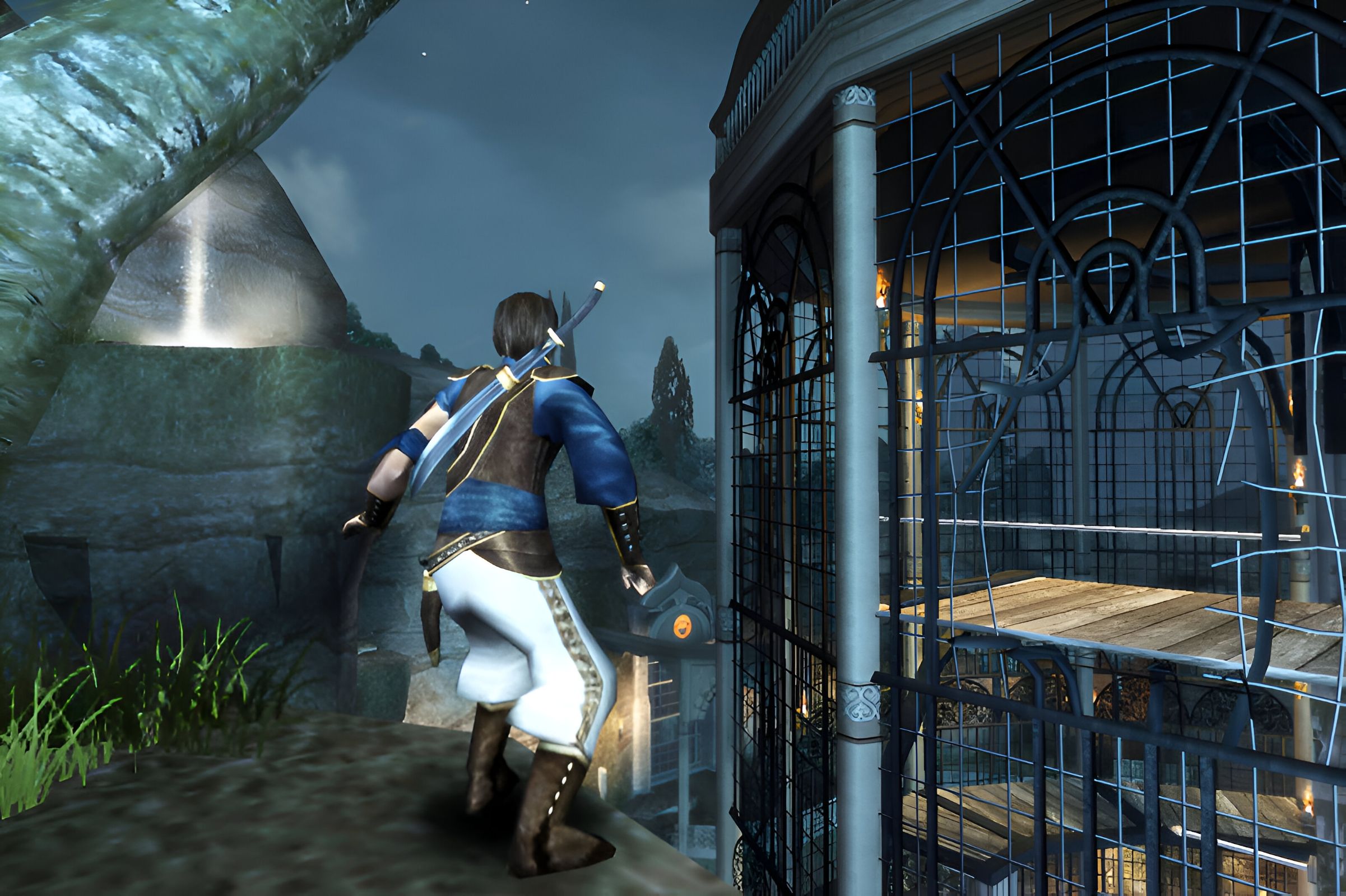 A screenshot from the game "Prince of Persia: The Sands of Time", showing the prince standing on a cliff next to a broken metal barrier.