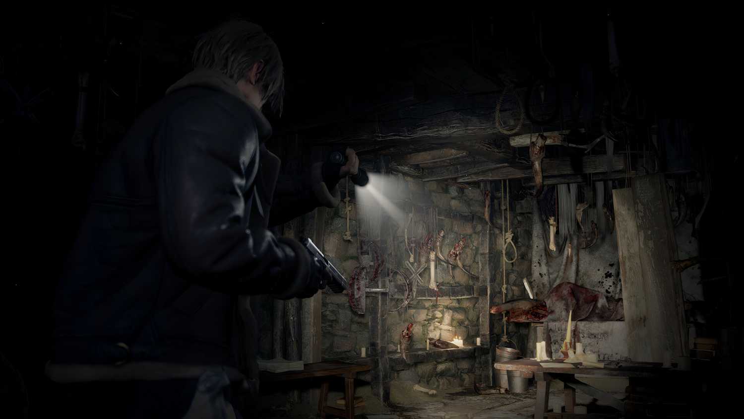 An image from the game Resident Evil 4 (2023), showing Leon Kennedy shining a flashlight in a dark room.